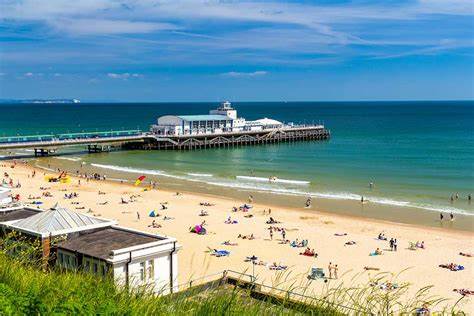 Bournemouth beaches viewed from Mojo yacht with golden sands and clear waters