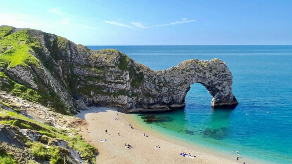 Dramatic cliffs of the Jurassic Coast viewed from Mojo yacht showcasing Dorset's natural beauty