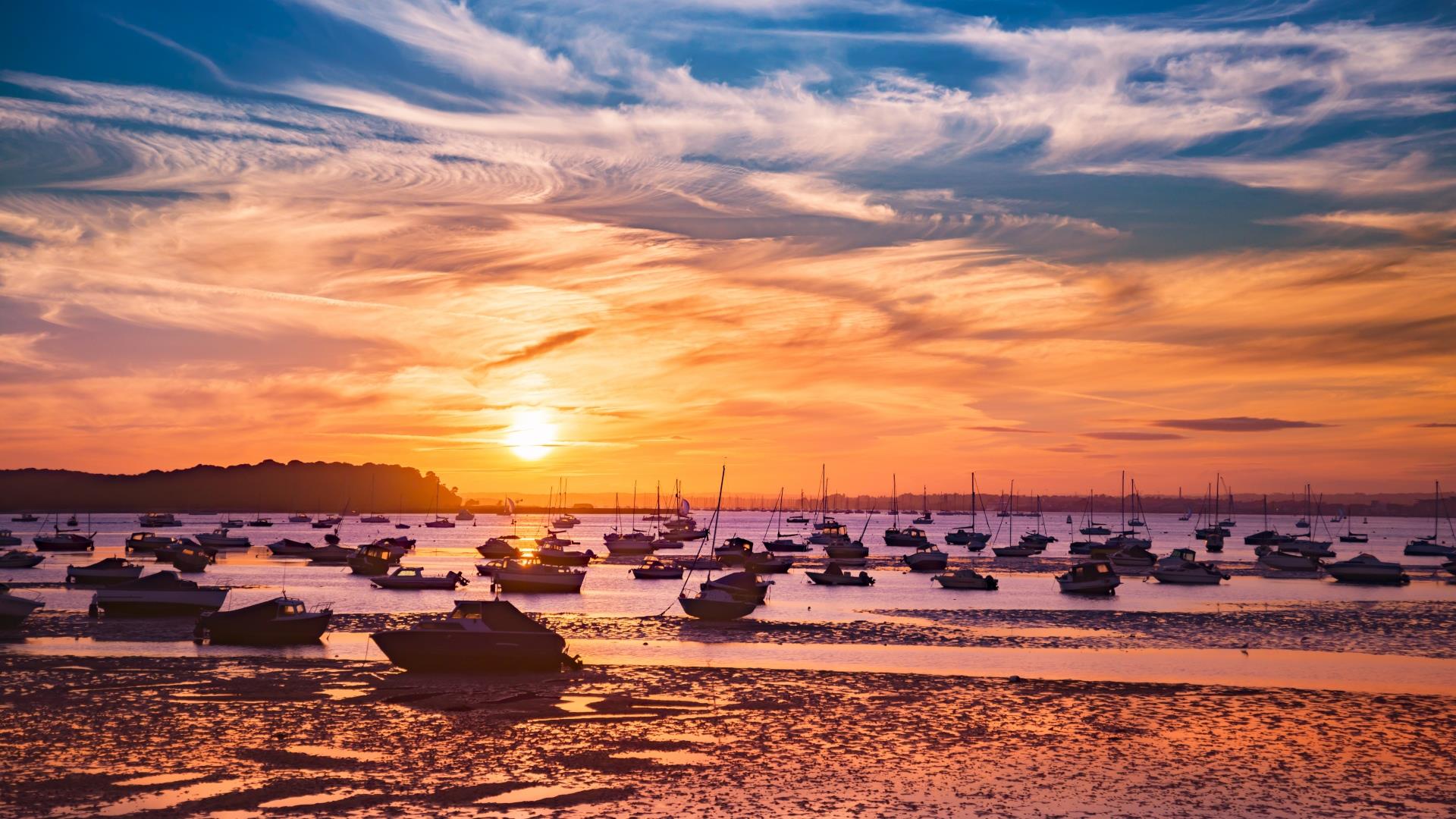 Stunning view of Poole Harbour from Mojo yacht with boats and natural scenery